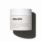 Juoda Kopa Volcanic Body Scrub with volcanic sand and botanical extracts for smooth, radiant skin.