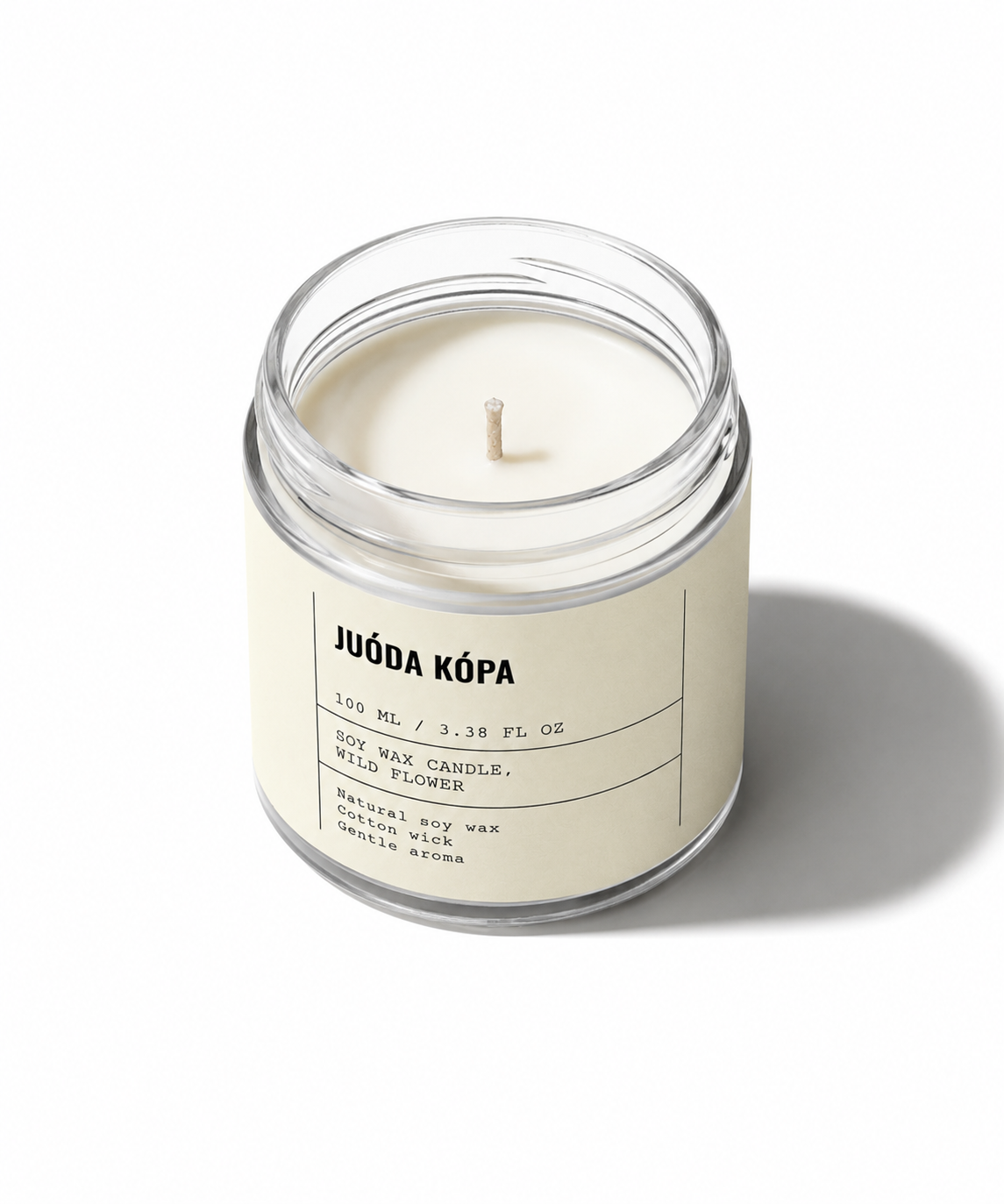 Candle in a glass jar with a label on a white background