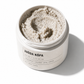 Juoda Kopa Volcanic Body Scrub with open jar showing creamy exfoliating texture and volcanic sand consistency.