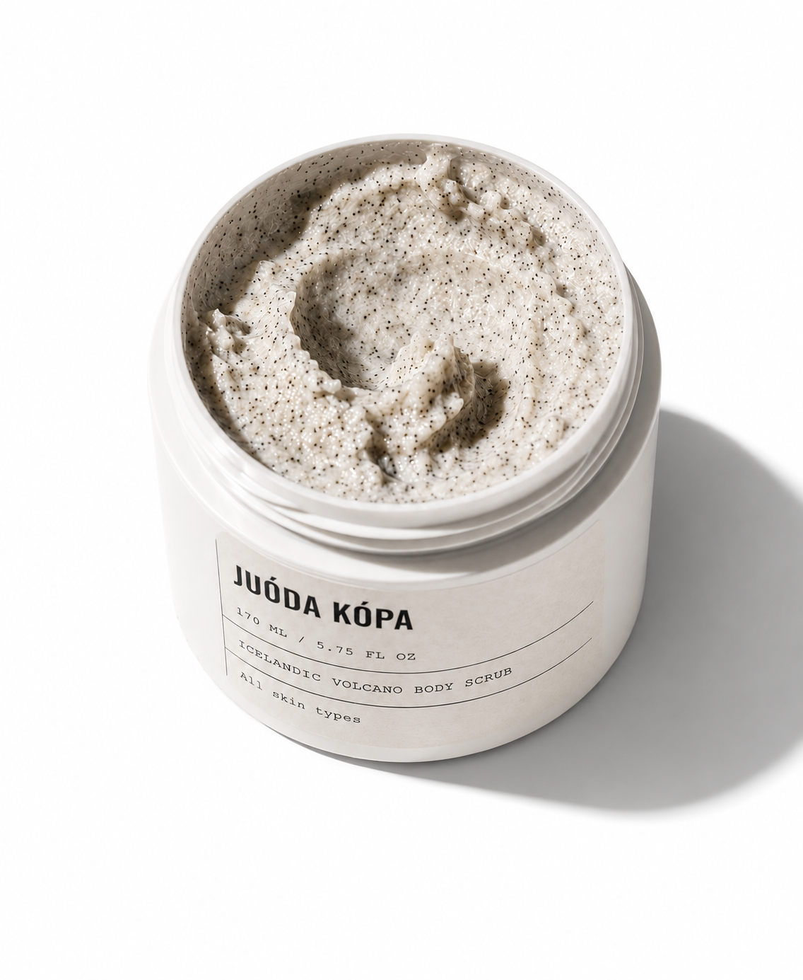 Juoda Kopa Volcanic Body Scrub with open jar showing creamy exfoliating texture and volcanic sand consistency.
