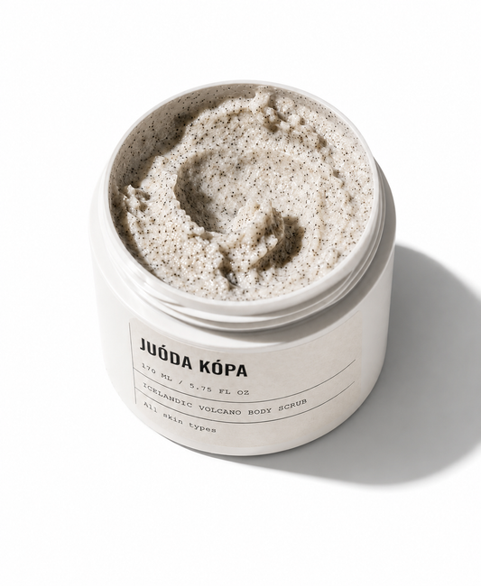 Juoda Kopa Volcanic Body Scrub with open jar showing creamy exfoliating texture and volcanic sand consistency.