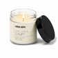 Candle in a glass jar with a label on a white background