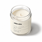 Candle in a glass jar with a label on a white background