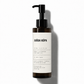 Skincare bottle with pump and white label on a white background